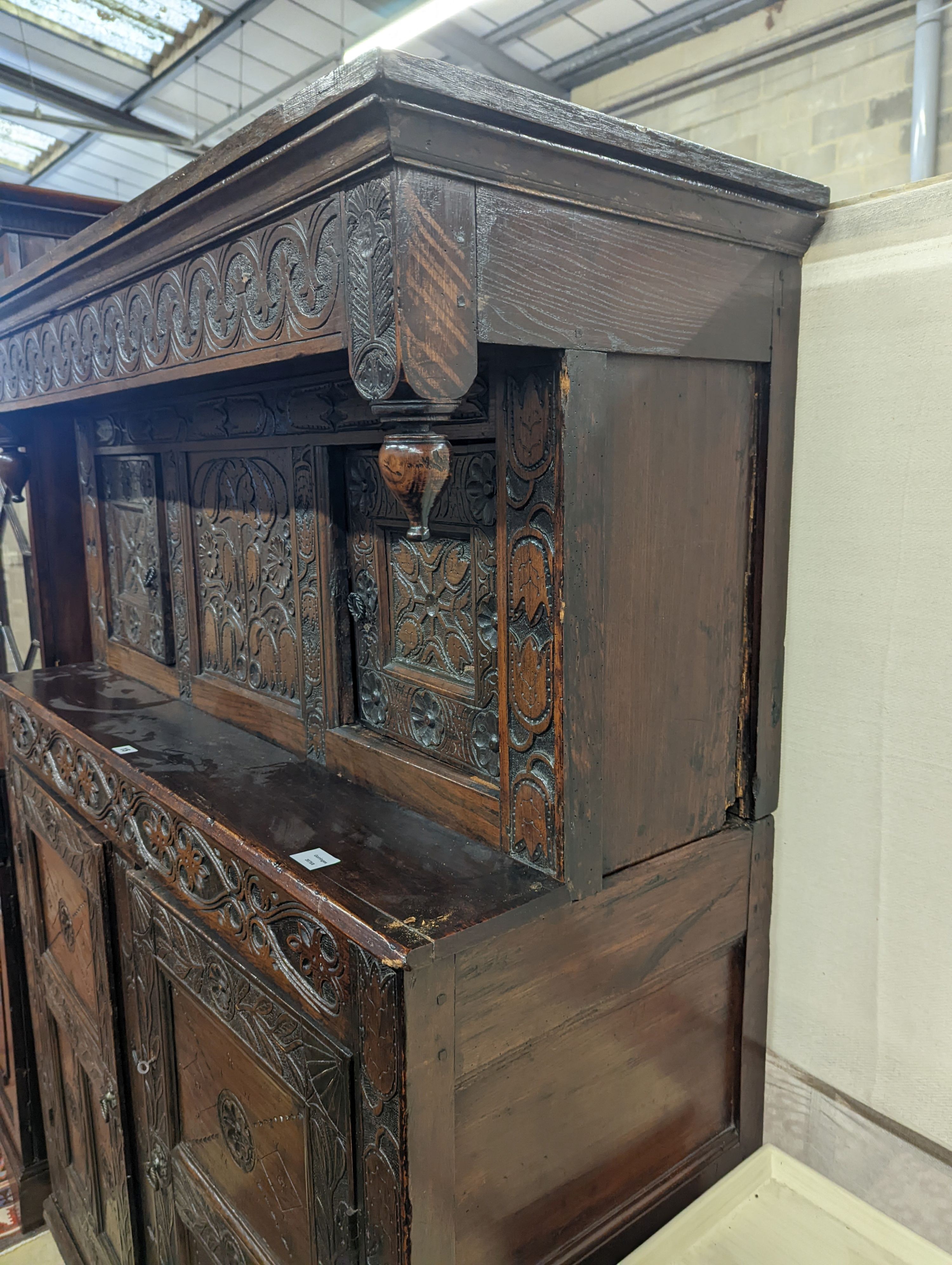 A 17th century and later oak court cupboard, width 129cm, depth 50cm, height 180cm
